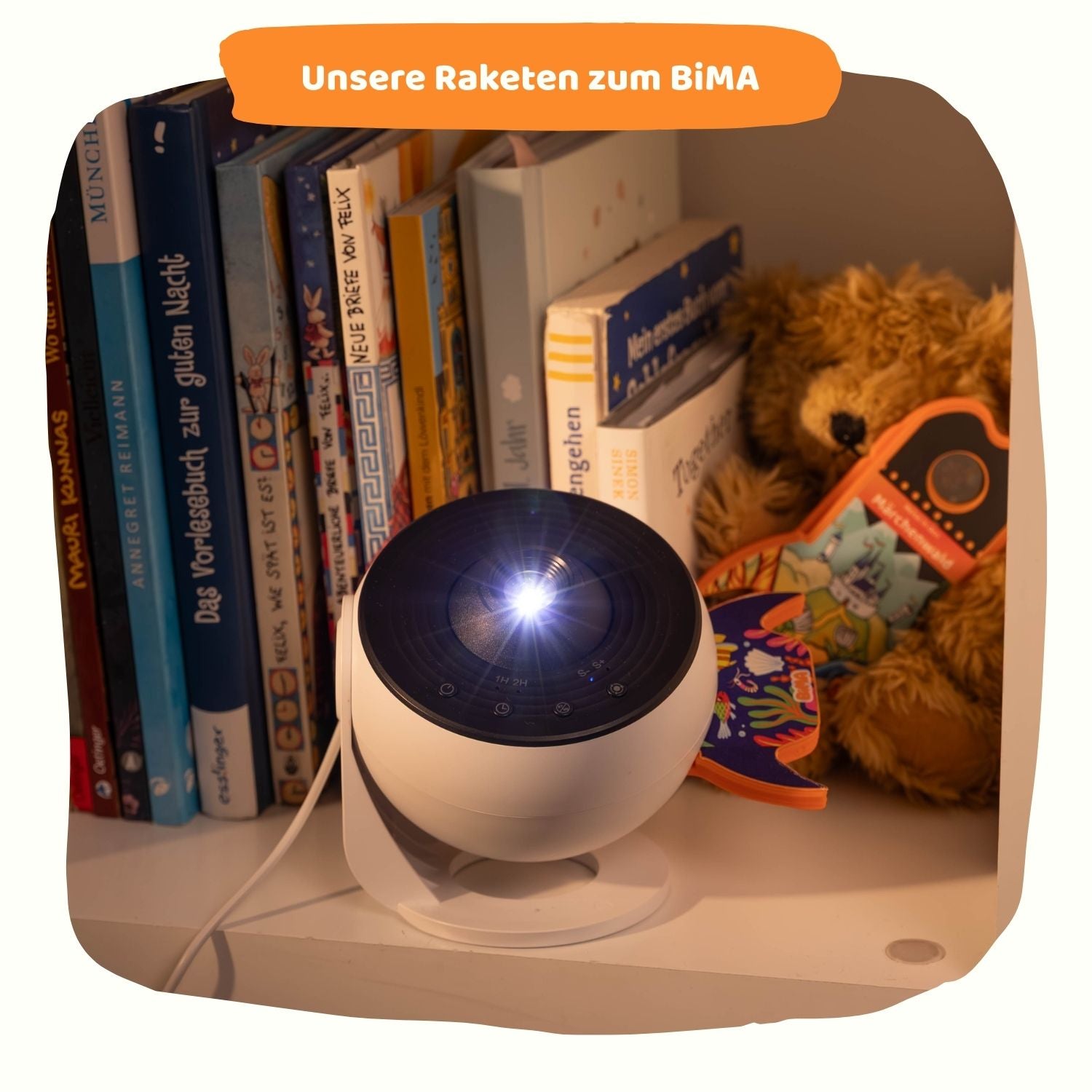BiMA Projektor und Lichterwelten-Raketen im Kinderzimmer.